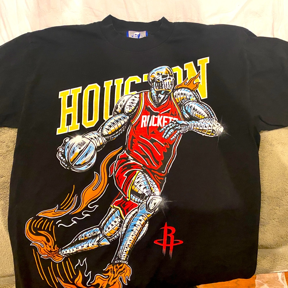Warren Lotas Rockets shirt size MEDIUM. Rare shirt, that sold out very quickly.